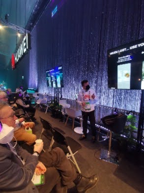 Serhad Akkoc presenting Huawei Mobile Services on stage at Slush